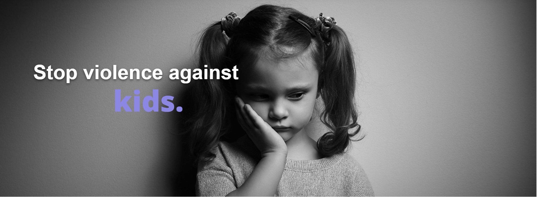 A young girl leaning against a wall, looking down. Caption: Stop violence against kids.